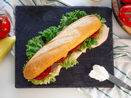 Hearty baguette sandwich with Labneh